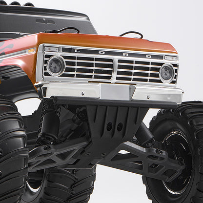 FMS 1:10 Ford F-100 Brushless RS orange monster truck front with FORD grille, flames, tires.