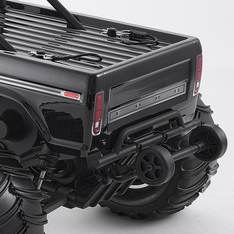 FMS 1:10 Ford F-100 RS black monster truck rear: Ford tailgate, roll bar, wheelie bar.