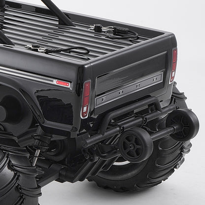 FMS 1:10 Ford F-100 RS black monster truck rear: Ford tailgate, roll bar, wheelie bar.