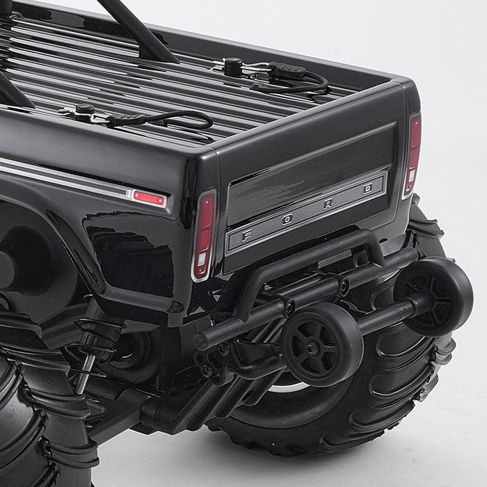 FMS 1:10 Ford F-100 RS black monster truck rear: Ford tailgate, roll bar, wheelie bar.