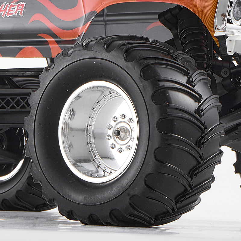 FMS 1:10 Ford F-100 Brushless RS monster truck tire with chrome wheel and flame graphics.