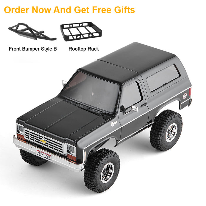 Black FMS 1:24 K5 Blazer RC truck with front bumper & rooftop rack. Includes free gift offer.