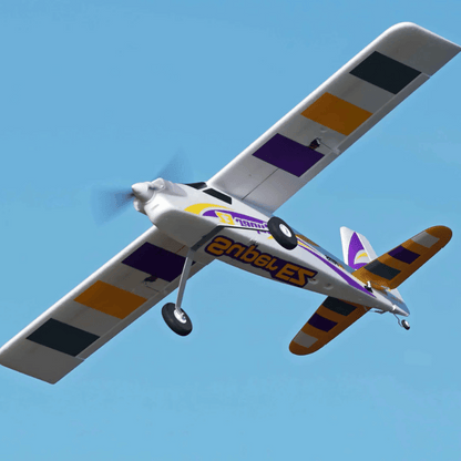 FMS 1220mm Super EZ V4 RC airplane in flight, white with purple and orange accents.