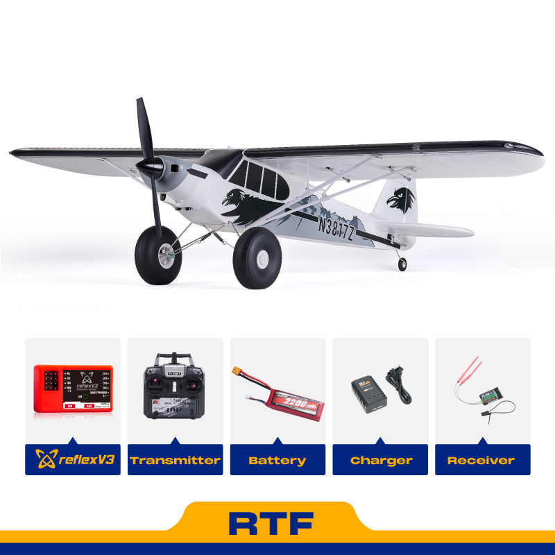 FMS 1300mm PA-18 Super Cub RTF RC airplane with Reflex V3, transmitter, battery, charger, and receiver shown.