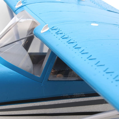 FMS 1500mm Maule RC airplane wing and cockpit detail, blue with rivets and clear windows