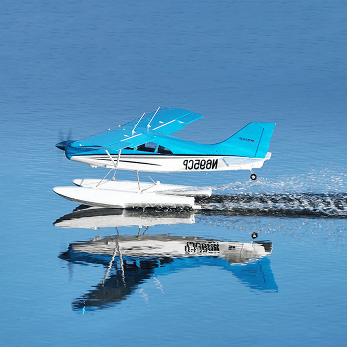 FMS Maule PNP flying over water with floats and clear reflections