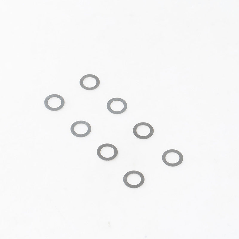 Product shot of seven 8x5.1x0.2mm Canyon Shims for 1:10 scale models.