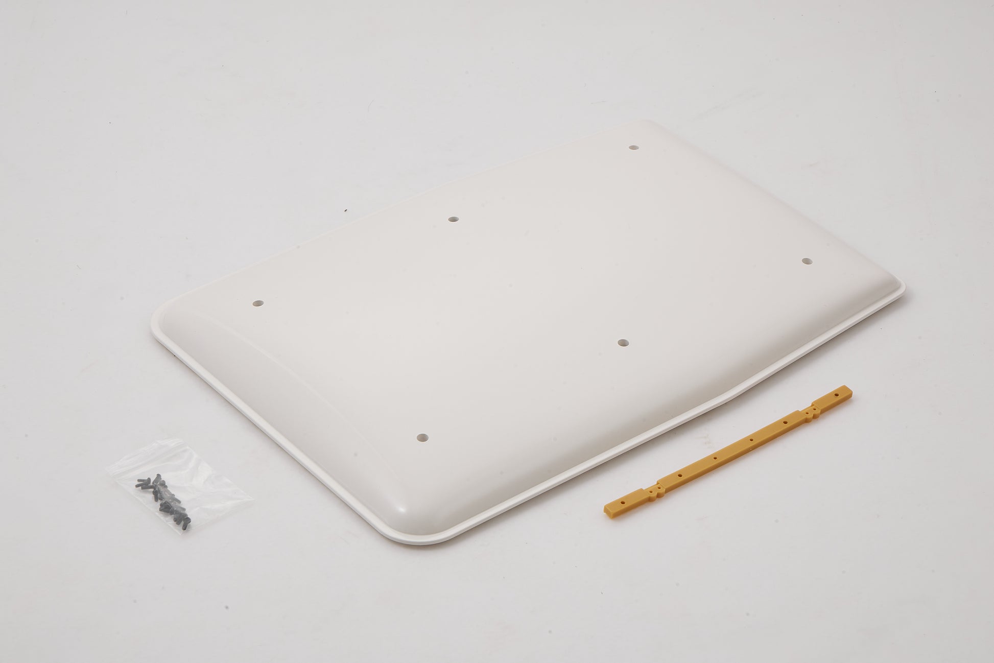 1:10 Toyota FJ40 roof cover accessory with screws and mount strip.