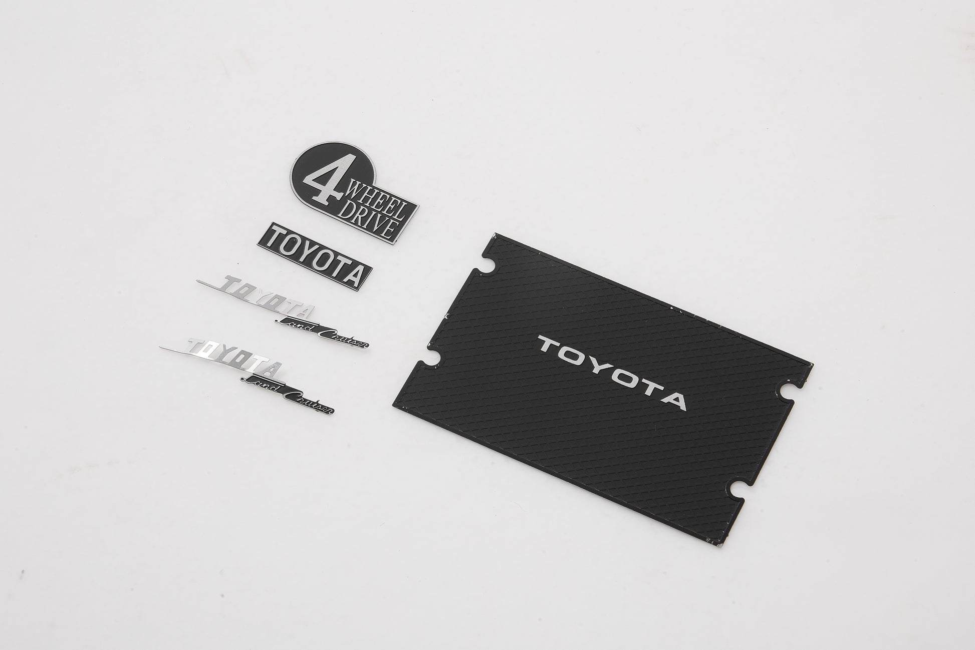 Toyota FJ40 nameplate and logo set including 4 Wheel Drive badge.