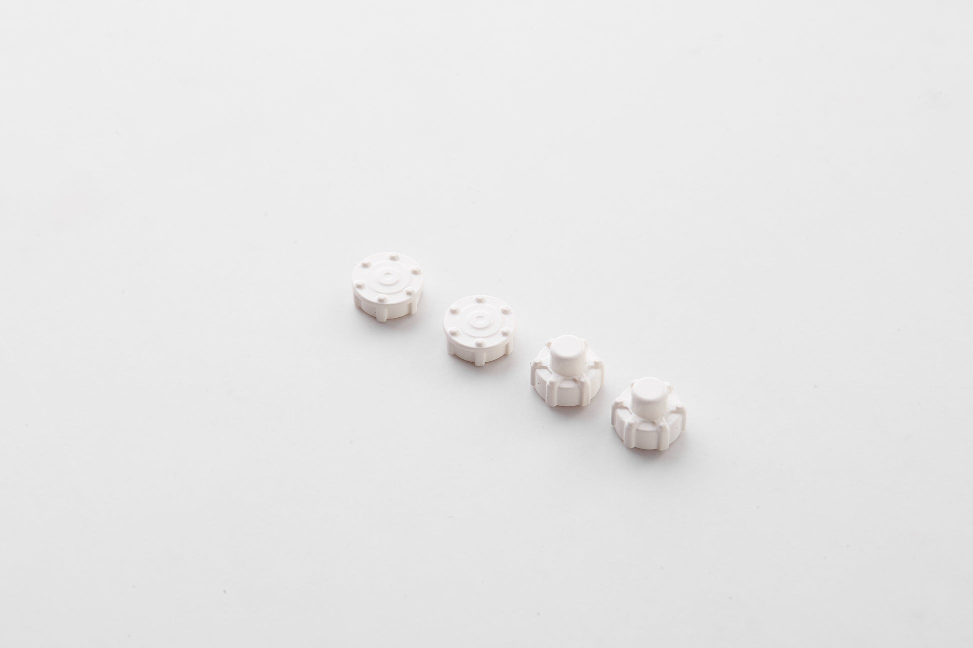 Set of four white wheel covers for 1:12 scale RC Land Rover models