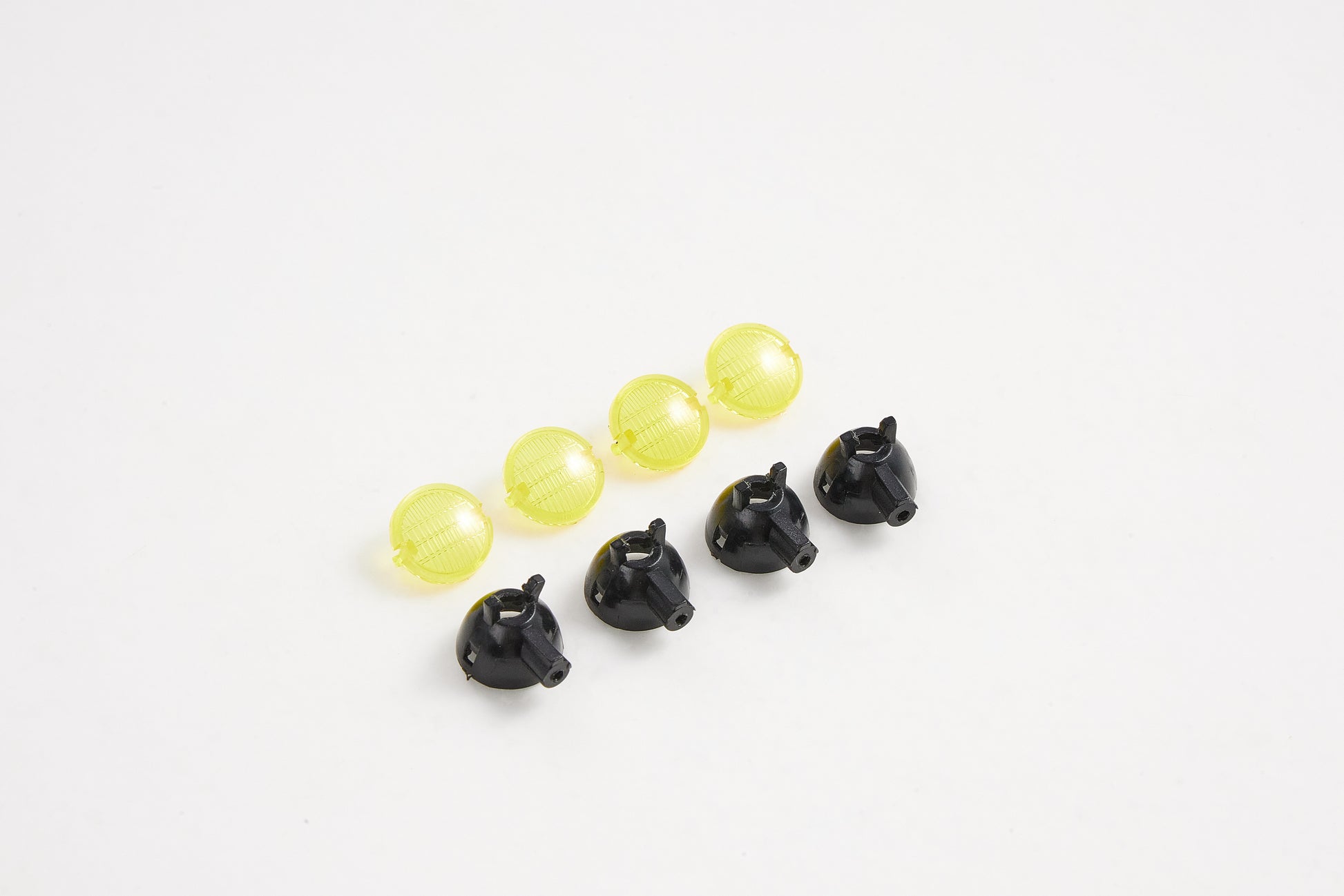 Spotlight Cup Set components for FCX18 Land Cruiser 80, yellow and black parts.