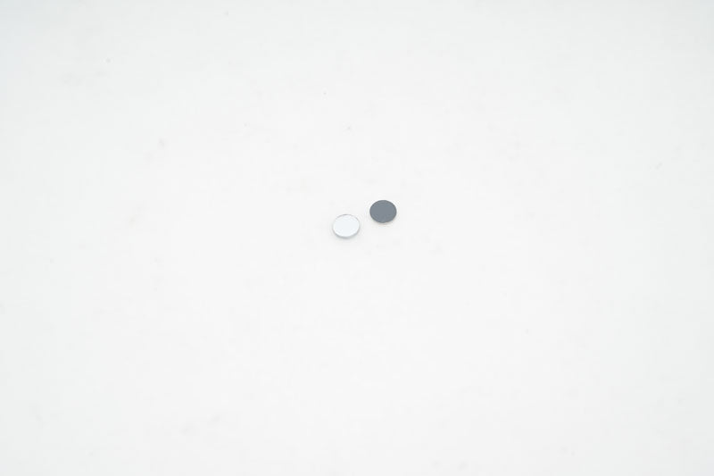 1:18 Magnum mirror lens components on white background
