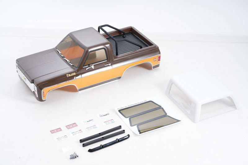 1:10 K5 Blazer car body in brown, orange, black with extra parts and decals.