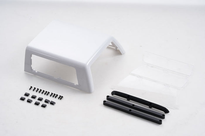 Black and white Chevrolet K5 Blazer hopper cover with window and parts