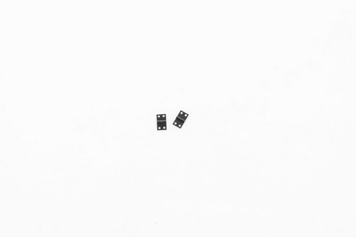 Miniature black hinges for 1:24 Unimog 421 model kit.