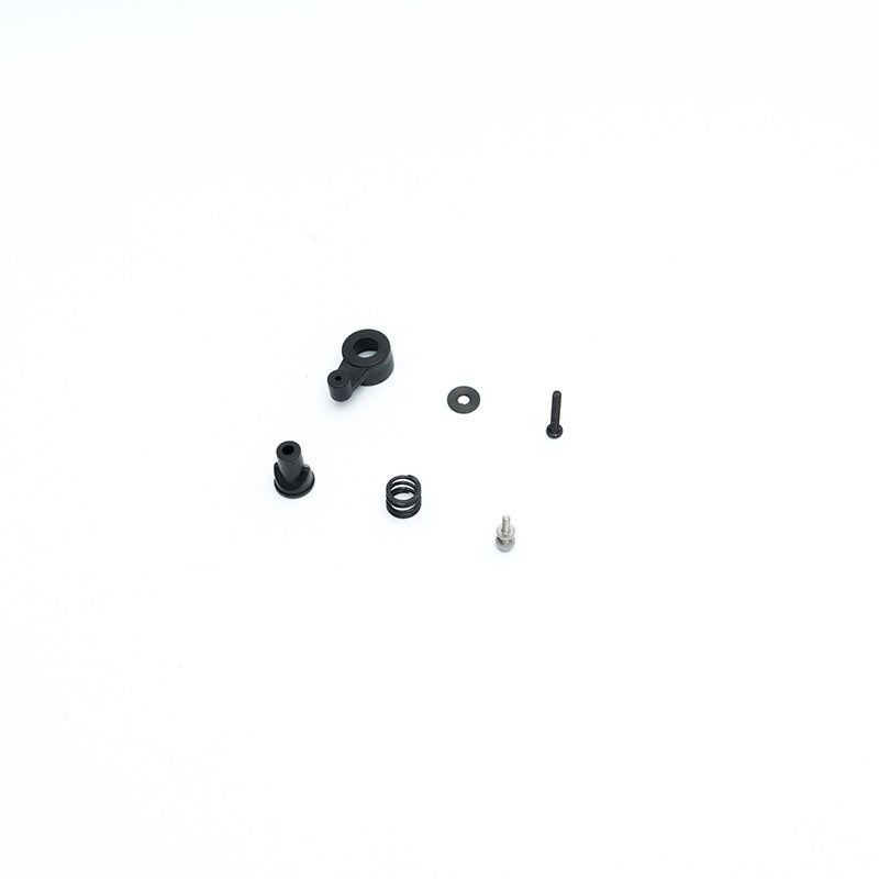 FCX24M steering servo saver set components including black plastic parts and screws.