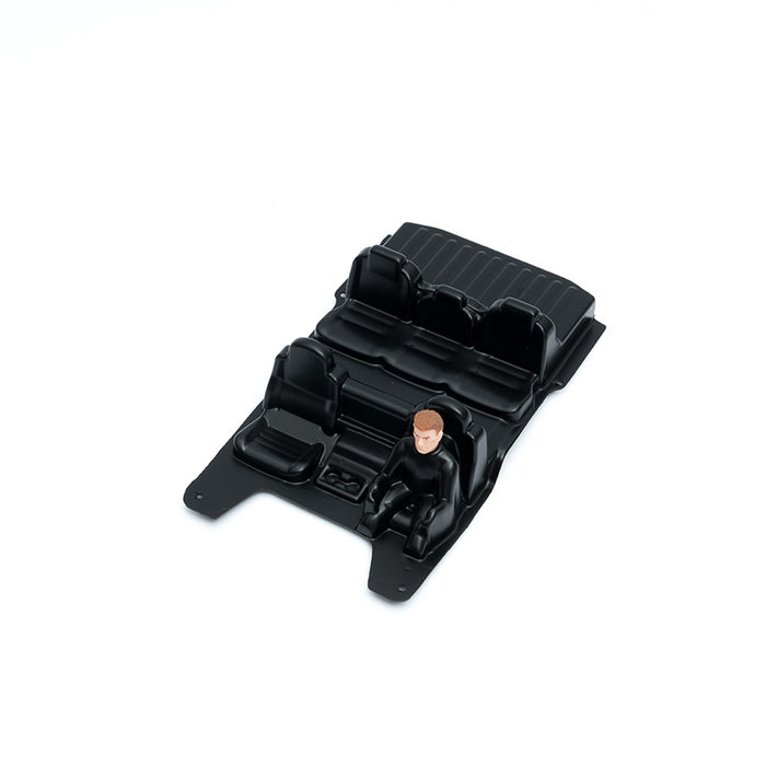 Upgrade seat compartment with figure for FCX24M RC model accessories.