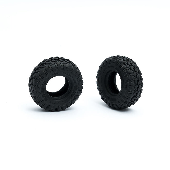 Pair of black RC off-road tires for FCX24M Defender 110/90 model.