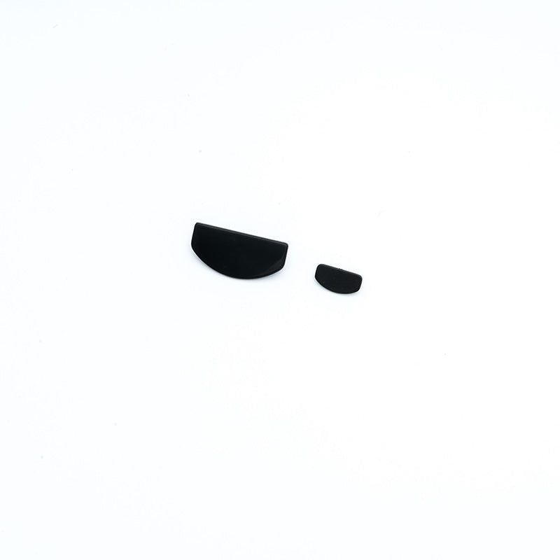 Black plastic half-moon shaped RC model parts for repairs