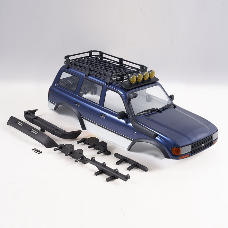 Painted blue FCX10 PRO LC80 car body assembly with roof rack, snorkel, and bumpers.