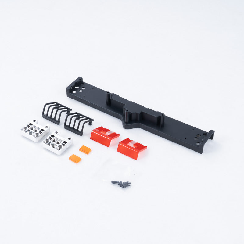 FCX10 Range Rover rear light set components including black chassis, silver light guards, red lenses.