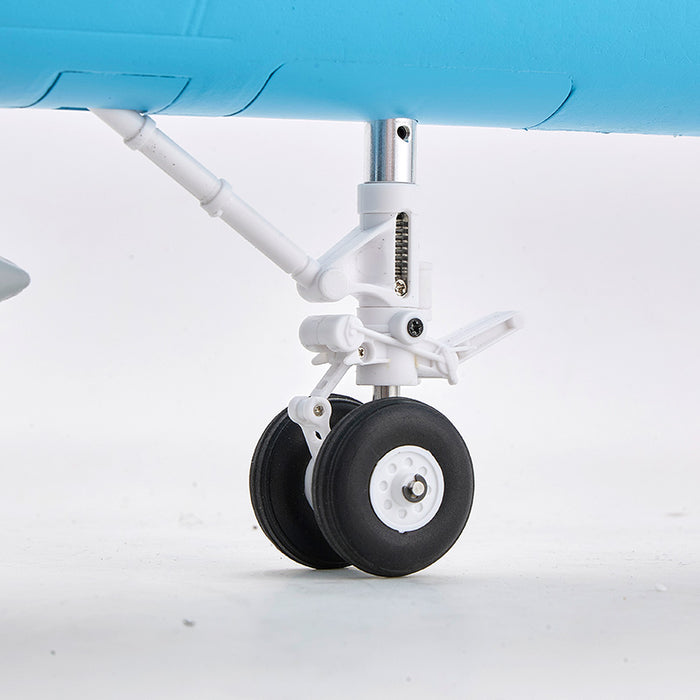 FMS F/A-18 Hornet jet PNP: close-up of the white landing gear with dual black wheels and silver struts.