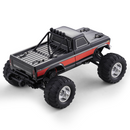 FMS 1:10 Ford F100 Monster Truck 2WD RTR, black with red stripe, large tires, roll cage.