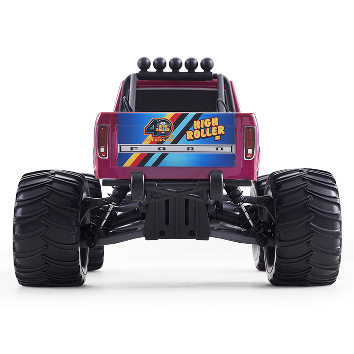 FMS 1:10 Ford F100 Monster Truck with 'High Roller' 40th Anniversary decal on the tailgate.