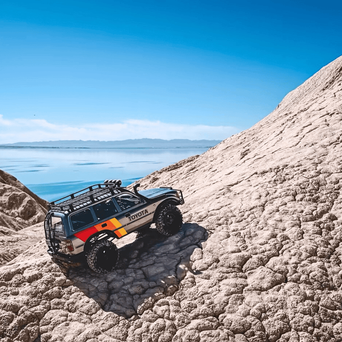 FMS 1:10 FCX10 LC80 Toyota Land Cruiser 80 RS RC crawler climbing rocks.