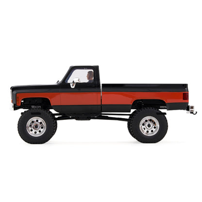 FMS 1:18 FCX18 Chevrolet K10 V2 RTR RC truck in black and red with off-road tires