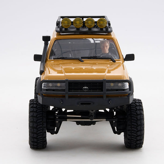 Yellow FMS 1:18 LC80 Toyota Land Cruiser 80 V2 RTR RC car with roof lights and snorkel