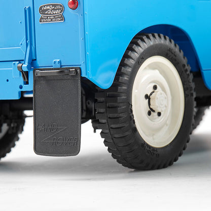 FMS 1:12 blue Land Rover Series II RTR model with detailed mud flap and off-road tire.