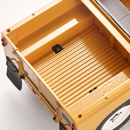 Yellow FMS 1:12 Land Rover Series II RTR model truck bed with ribbed floor detail