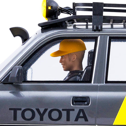 FMS 1:10 LC80 Toyota Land Cruiser driver figure with yellow cap