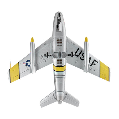 Silver FMS 80mm EDF Jet F-86 Sabre PNP RC airplane with yellow accents and USAF markings, featuring retractable landing gear.