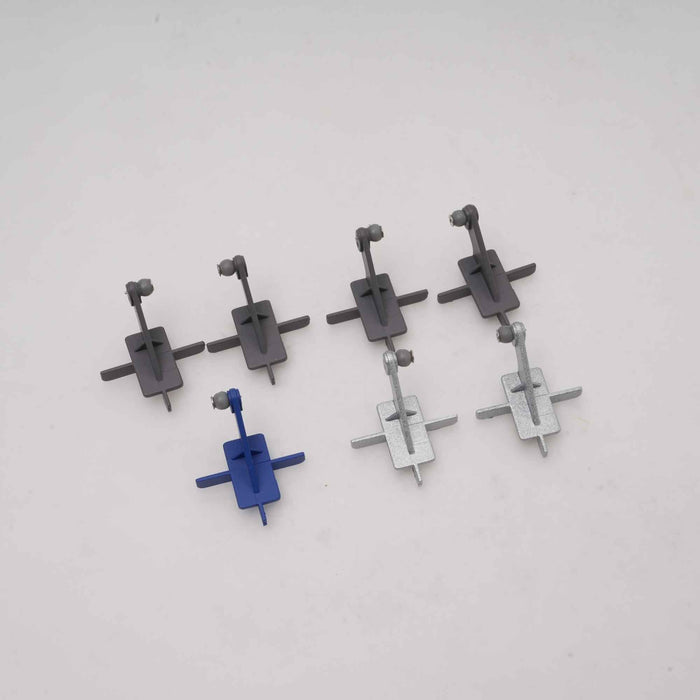 Four integral control horns in red, gray, and blue for remote control models