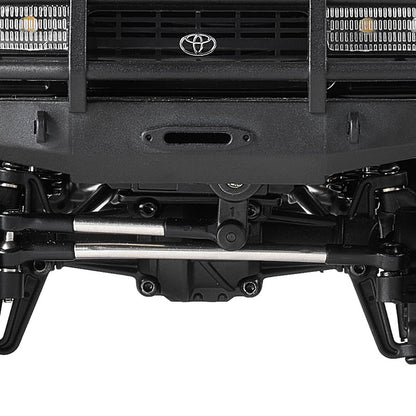 FMS 1:18 LC80 Toyota Land Cruiser 80: Close-up of front bumper, grille with Toyota logo, and suspension.