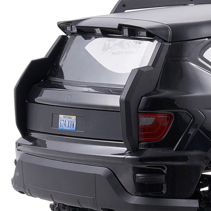 Black FMS 1:10 Canyon RS remote control car rear view, with Nevada license plate 674:XVW