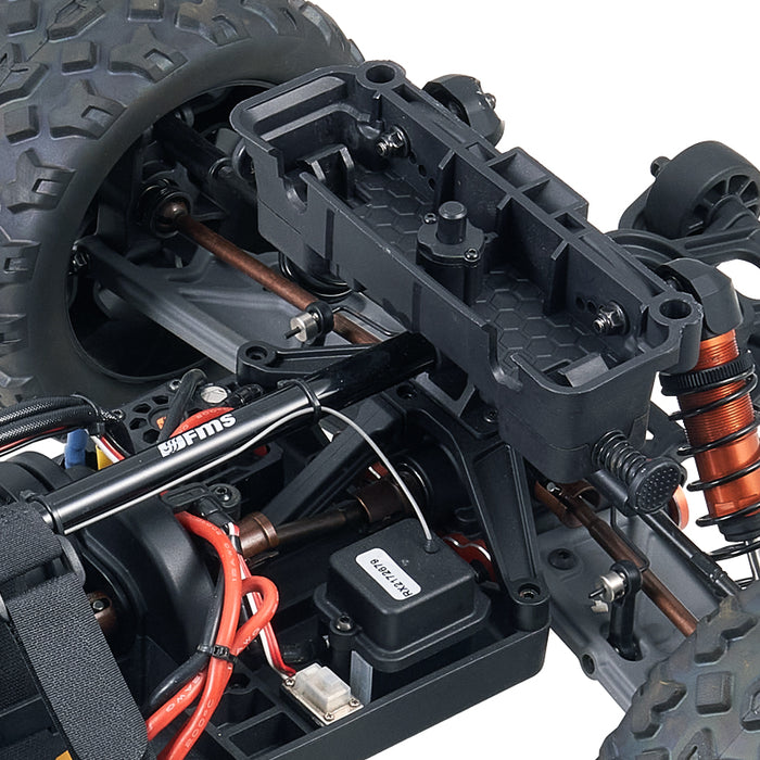 FMS 1:10 Colorado basher chassis detail: drivetrain, orange shocks, receiver box