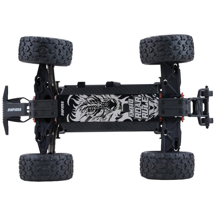 FMS 1:10 FMT10 Chevrolet Colorado Basher RS 4WD chassis with roaring lion graphic and large knobby tires.