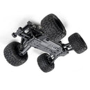 FMS 1:24 Chevrolet Colorado monster truck chassis with large off-road tires.