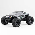 FMS 1:24 FMT24 Chevrolet Colorado monster truck RTR in black, featuring rugged tires and FMS Racing graphics.