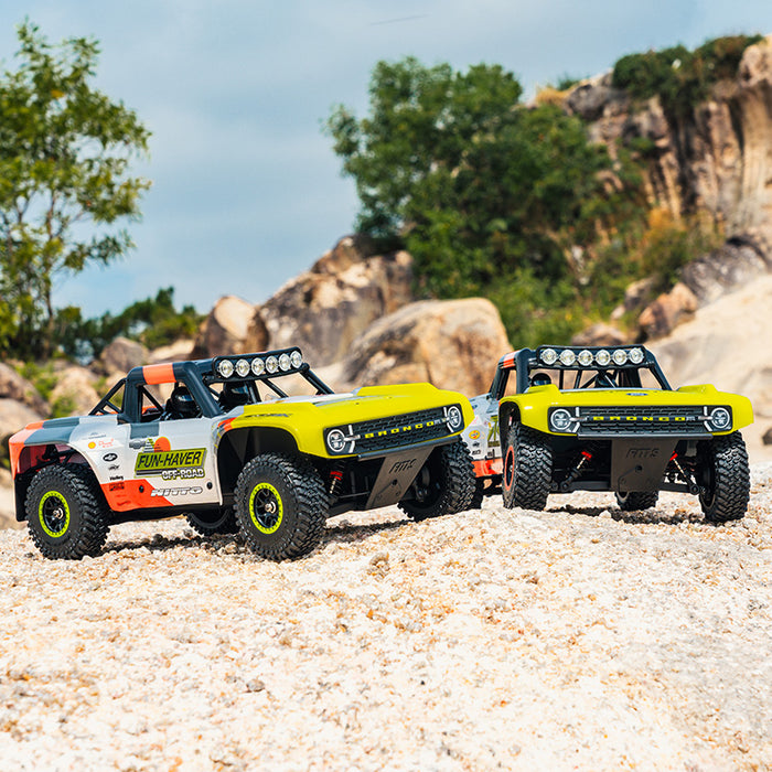 Two FMS 1:18 Ford Bronco RTR EB Fun-Haver off-road trucks.