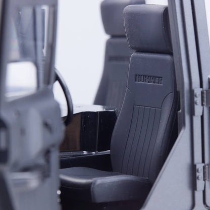FMS 1:12 Hummer H1 Alpha RTR interior, black seats with "HUMMER" embossed