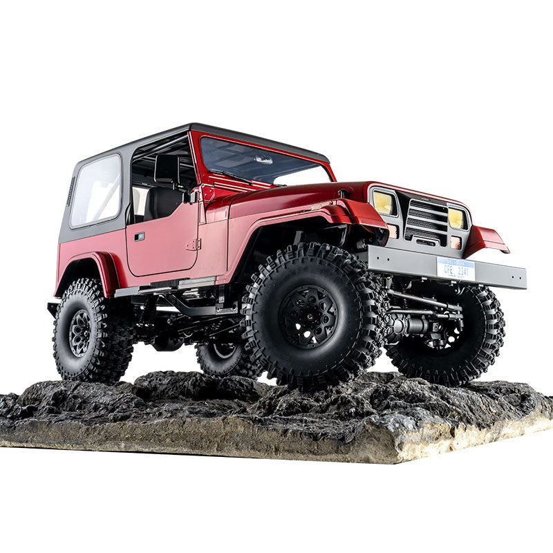 ROCHOBBY 1:10 Mashigan RC Rock Crawler RS Red 4WD with off-road tires on rocky terrain.