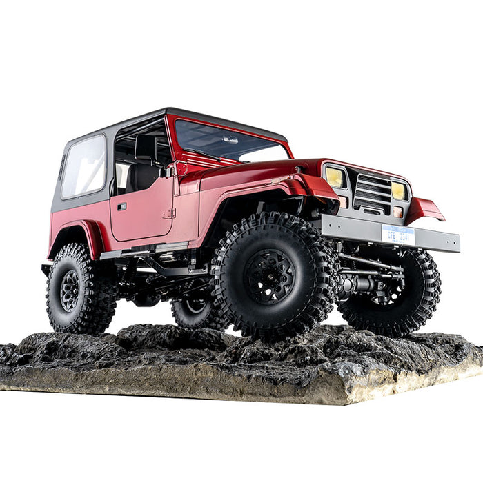 ROCHOBBY 1:10 Mashigan RC Rock Crawler RS Red 4WD with off-road tires on rocky terrain.