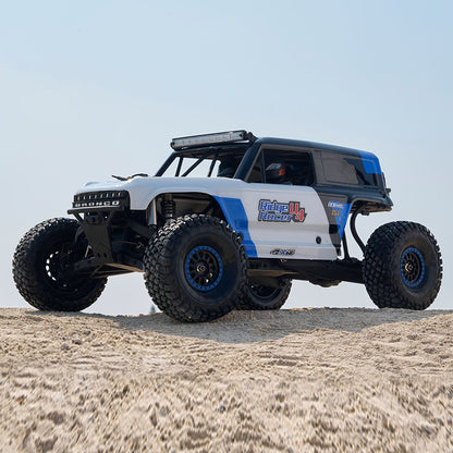 ROCHOBBY 1:7 Ridge Racer U4 desert buggy RC car with blue and white graphics, large tires, and light bar.
