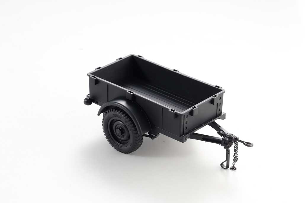Detailed black utility trailer model with wheels and hitch for RC vehicles.