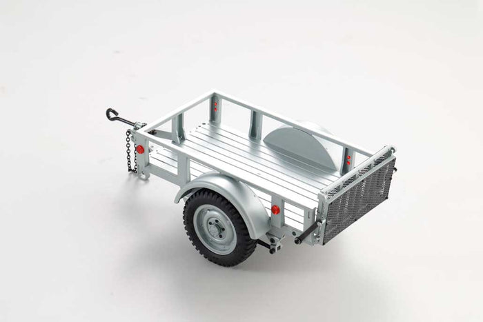 Silver 1:18 utility trailer model with realistic wheels and hitch for RC vehicles.