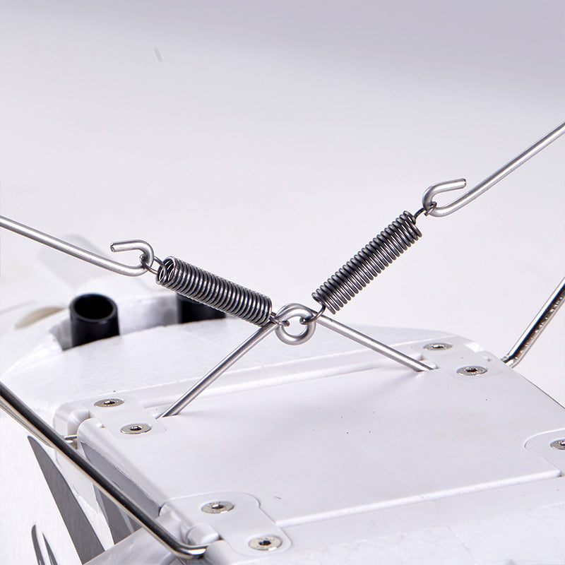 FMS 1300mm PA-18 Super Cub landing gear with metal springs and wire struts.